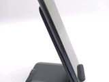 a cell phone that is sitting on top of a stand