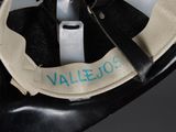 a black and white bag with a name tag on it