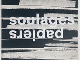 une photo en noir et blanc d'une affiche sur laquelle on peut lire « soudages bades »