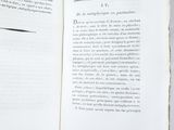 an open book that has a picture of a bird on it