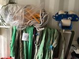 many different types of cords hanging on the wall