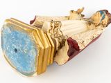 a figurine of a woman in a boat with a man on it
