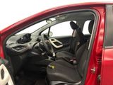 a red car with black seats and a steering wheel