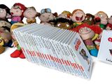 a pile of books with a bunch of cartoon characters on it