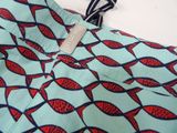 a close up of a bag with a tie on it