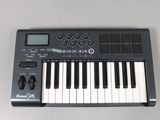 a keyboard that is sitting on top of a table