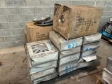 a pile of boxes and a box on top of a pile of boxes