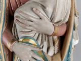 a statue of a woman holding a baby in her arms