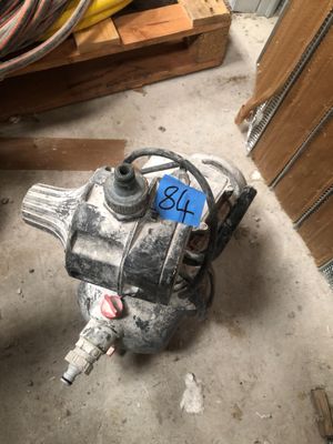 an image of a water pump in a garage