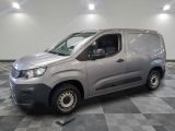 a picture of a silver van parked in a room