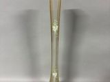 a glass vase that is sitting on a table