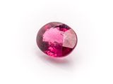 a pink tourmaline gems on a white background