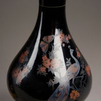 Paire de lampes à pétrole en céramique émaillée noir à décor… (photo 4)