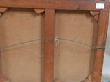 a picture of an old wooden box with a glass door