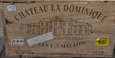 a wooden box with a label on it sitting on a table