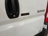 a close up of the back end of a white truck