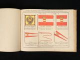 an open book with a picture of flags on it