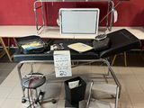 a desk with a laptop and a monitor on top of it