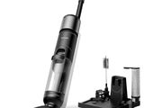 an image of a black and silver cordless vacuum cleaner