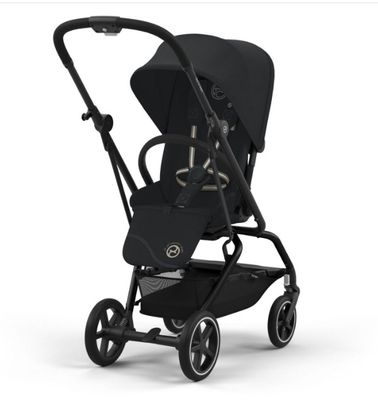 une poussette noire avec un siège noir et des roues noires