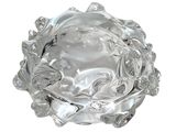 a glass bowl with a design on it on a white surface
