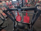 a large gym with a lot of machines in it