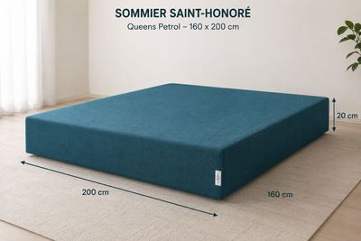an image of a blue mattress sitting on top of a wooden floor