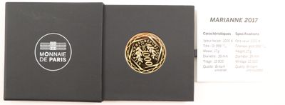 the box is open to show the contents of the perfume