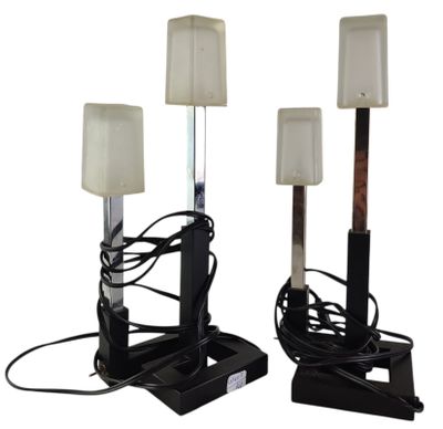 pair of black and white lamps with shades on them on a white background