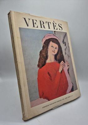 la couverture d'un magazine sur laquelle figure le portrait d'une femme en robe rouge