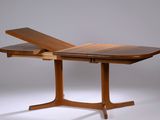 an image of a table with a wooden top and a wooden base