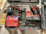 a box with tools in it sitting on the floor