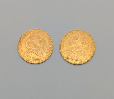 deux souverains d'or, dont l'un représente une tête et l'autre une tête