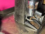 a coffee maker and a pair of scissors on a counter