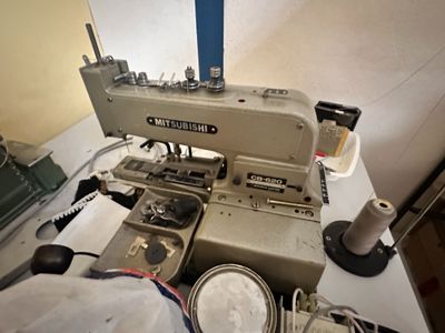 a sewing machine that is sitting on a table