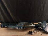 a vacuum that is sitting on a wooden table