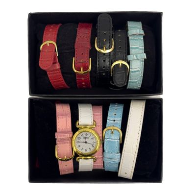 Une montre DMH, cadran en métal doré, index pour les heures …