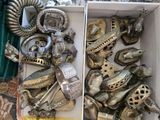 a box full of metal items sitting on a table