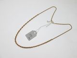 a close up of a necklace with a price tag on it