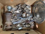 a box full of old silverware in it