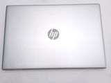 a laptop that is sitting on a white table