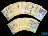 a lot of pokemon cards on a black background