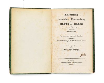 an open book with a black and white image of a man ' s name on it