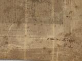 a piece of paper with a drawing of a man on a horse