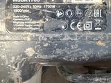 a close up of a car ' s front bumper with a number plate on it