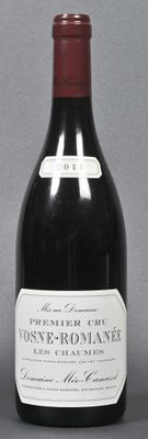 a bottle of wine that is sitting on a table