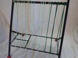 a picture of a rack with a bunch of clothes hanging on it