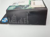 a close up of a box of ink sitting on top of a table