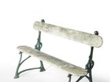 a wooden bench that is sitting on a white surface