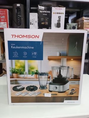 a box that has a blender in it on a table
